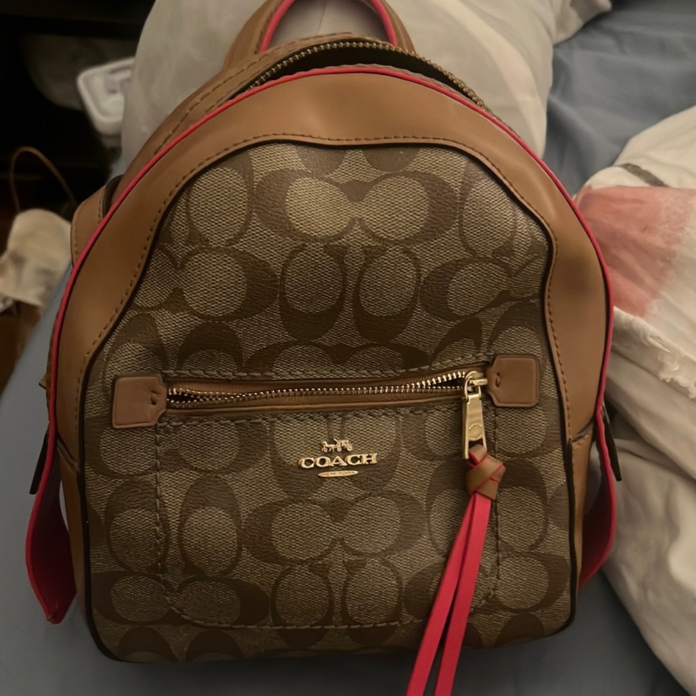 Pink and brown coach backpack with adjustable straps 9/10 condition